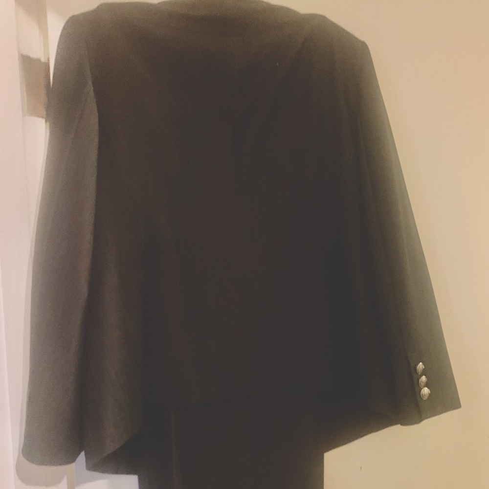 Rayon polyester fully lined women suit gray. Shaped firm shoulders a slim look.